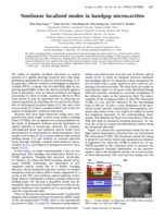 Nonlinear localized modes in bandgap microcavities