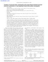 Creation of second-order nonlinearity and quasi-phase-matched second-harmonic generation in Ge -implanted fused silica planar waveguide