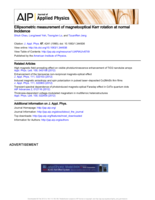 Ellipsometric measurement of magneto-optical Kerr rotation at normal incidence
