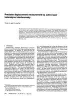 Precision displacement measurement by active laser heterodyne interferometry